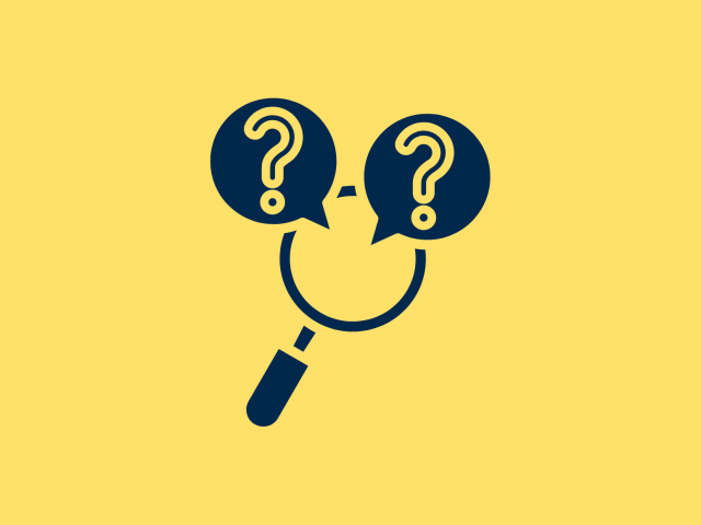 Dark blue magnifying glass with pale yellow background