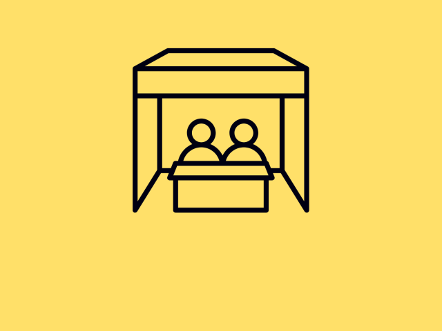 Two stick figures in a booth with a yellow background.